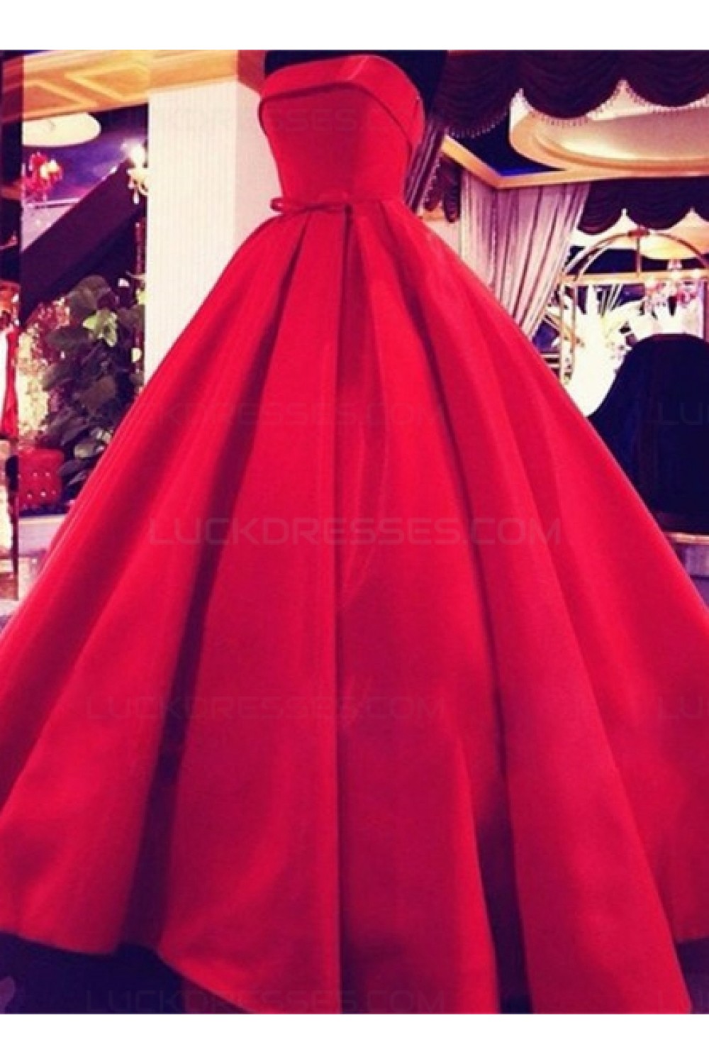 red strapless ball gown